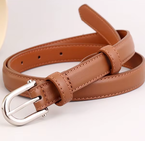 The Custom Touch. An  exquisitely crafted belt defining  your waistline.